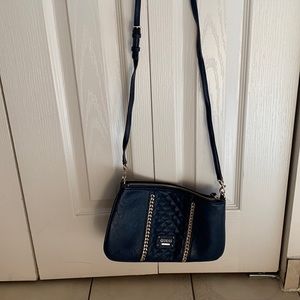 Navy blue, guess, leather purse with a gold.